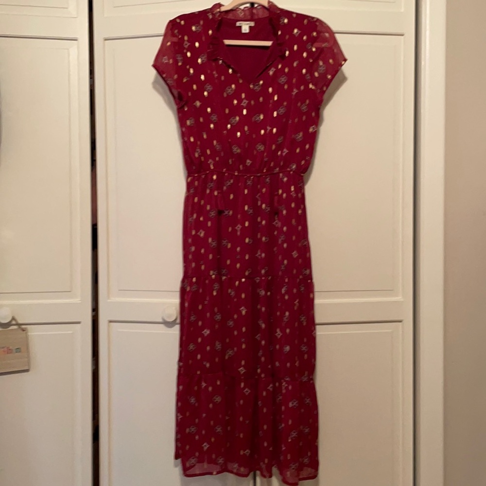 Dress with cap sleeves with tassel ties at neck